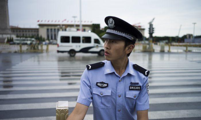 China Prepares for Military March by Arresting Elderly Street Speaker