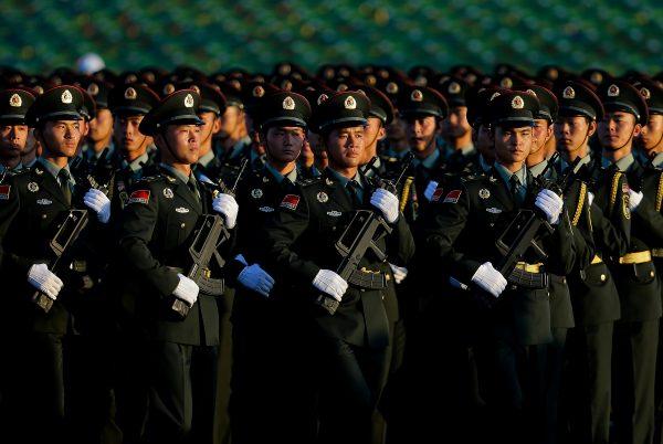 Chinese People's Liberation Army troops practice marching in Beijing in a file photo. (AP Photo/Andy Wong)