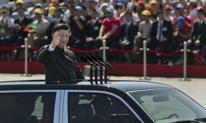 Political Fight in China to Continue as Party Elder Shows Up at Military Parade