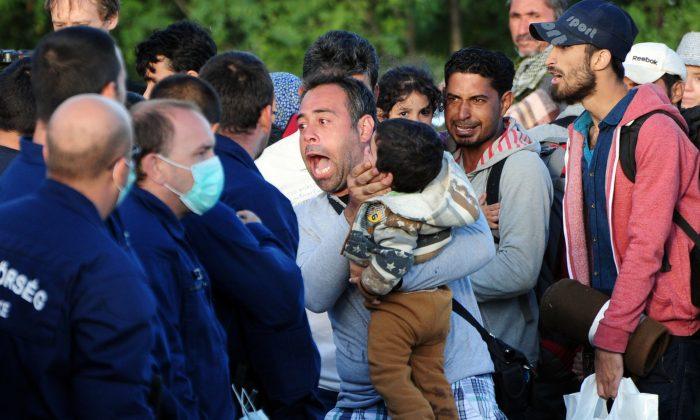 Migrants Break Through Hungary Police Lines Near Serb Border