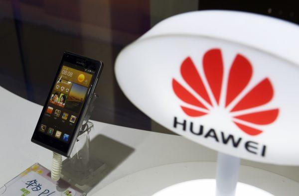 A mobile phone made by Chinese telecom equipment maker Huawei is displayed in a store in Beijing on Aug. 3, 2015. (Greg Baker/AFP/Getty Images)