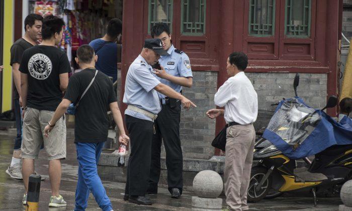 Why the Beijing Police Have Broken Up a Meeting of 80-Year-Olds
