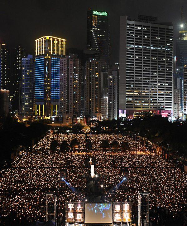 Thousands of people take part in a candlelight vigil to commemorate the 22nd anniversary of the Tiananmen Square massacre at a park in Hong Kong, on June 4, 2011. (Mike Clarke/Getty Images)