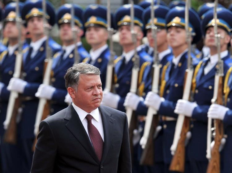 Jordan's King Abdullah II inspects a guard of honor during a welcoming ceremony on June 22, 2011. (Sergei Supinsk/AFP/Getty Images)