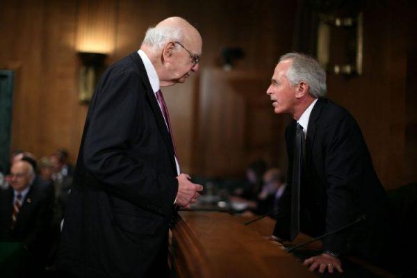 Former Federal Reserve Board Chairman, Paul Volcker (L) talks with U.S. Sen. Bob Corker (R-Tenn.) (R) prior to a hearing before the Financial Institutions and Consumer Protection Subcommittee of the Senate Banking, Housing, and Urban Affairs Committee on Capitol Hill in Washington on May 9, 2012. (Alex Wong/Getty Images)