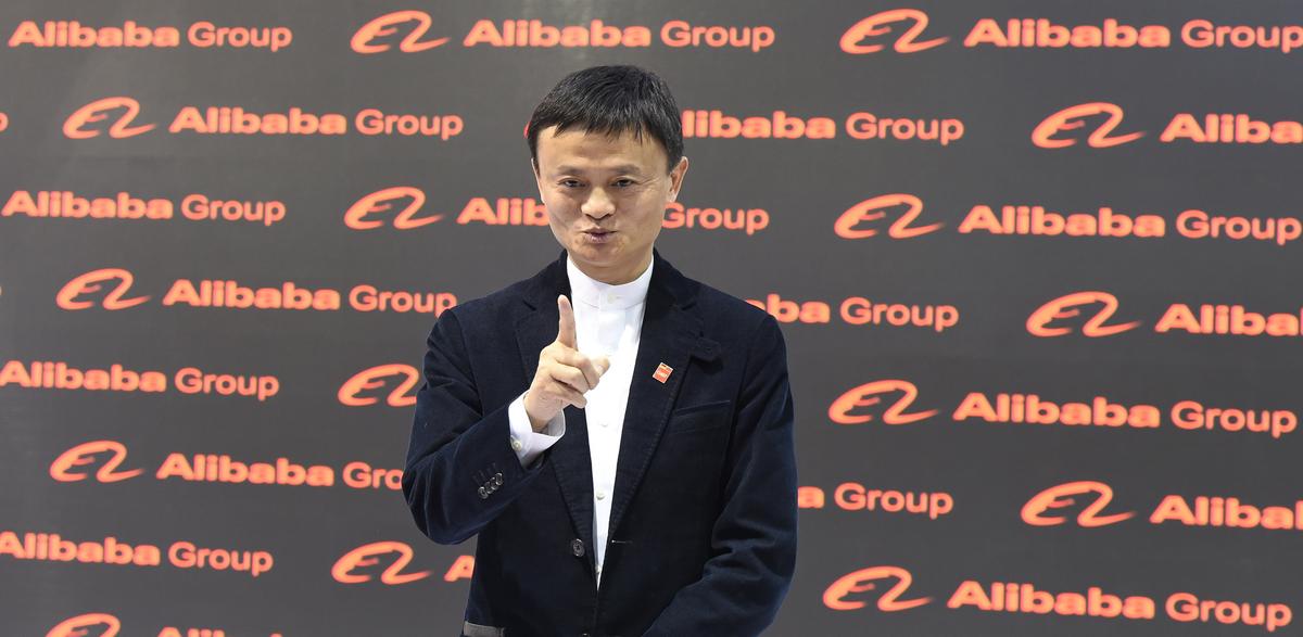 Jack Ma poses for the media at the Alibaba booth during the opening day of the CeBIT technology fair in Hanover, central Germany, on March 16, 2015. (Tobias Schwarz/AFP/Getty Images)