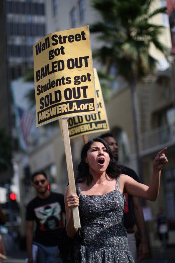 Students protest the rising costs of student loans for higher education on Hollywood Boulevard in Los Angeles, Calif., on Sept. 22, 2012. (David McNew/Getty Images)