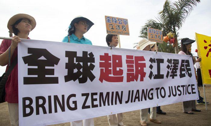 Persecuted Group Holds Rally to Support Lawsuits Against Former Chinese Leader