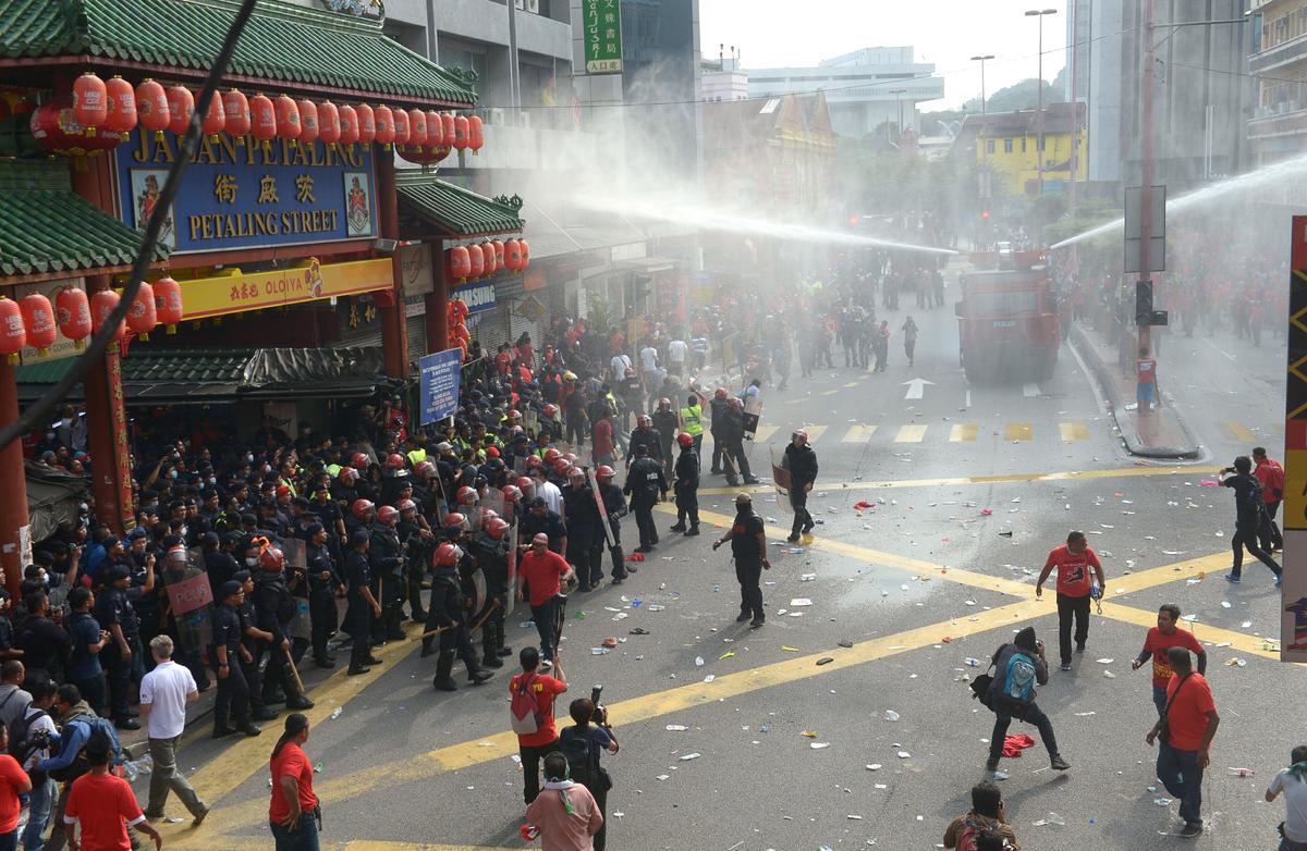 Malaysian Police Fire Water Cannons at Malay Protesters