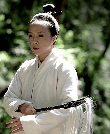Taoist martial arts master Princess Nun Jiaxin (also her twin sister Princess Jiacheng, both played by<span style="color: #000000;"> Fang-yi Sheu </span>with her Taoist whisk, in "The Assassin." (Well Go USA)