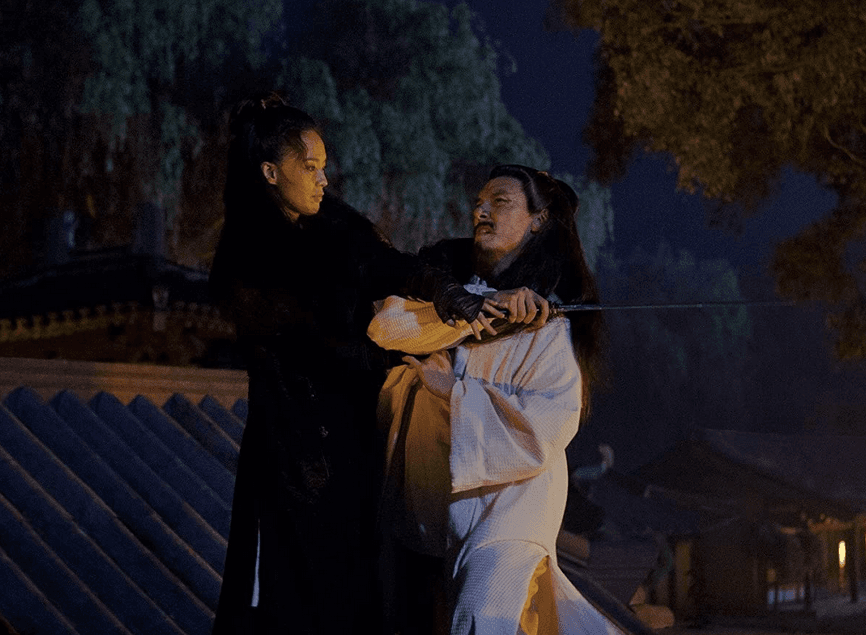 Nie Yinniang the assassin (Shu Qi) fights Tian Ji'an (Chang Chen), in "The Assassin." (Well Go USA)