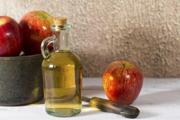 A severe case of indigestion after a meal can often be resolved by continually taking shots of apple cider vinegar until you find relief. (fotoedu/iStock)