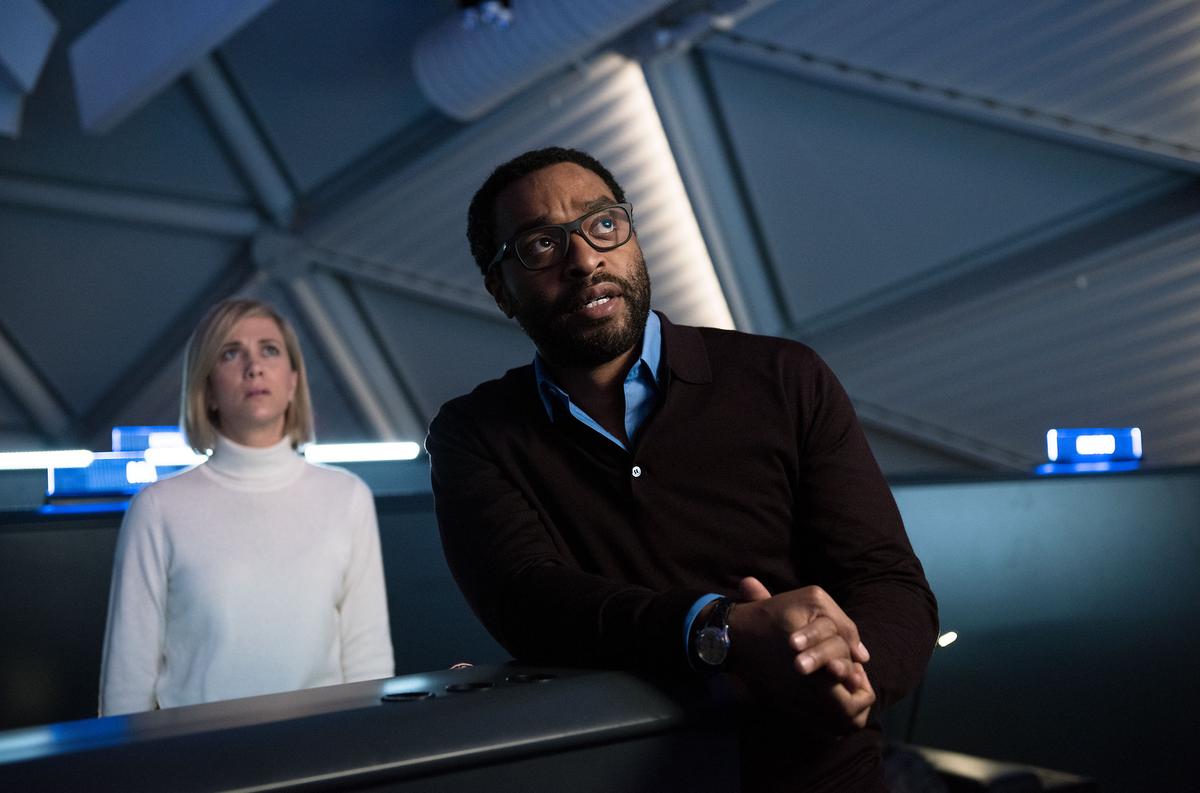 Annie Montrose (Kristin Wiig), who is NASA’s media relations director, and NASA’s director of Mars missions, Dr. Vincent Kapoor (Chiwetel Ejiofor), do everything they can to bring home an astronaut stranded on Mars, in "The Martian." (Twentieth Century Fox/Twentieth Century Fox Film Corporation)