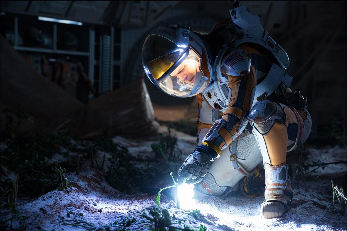 Matt Damon portrays an astronaut who draws upon his ingenuity to subsist on a hostile planet.(Giles Keyte/Twentieth Century Fox Film Corporation)