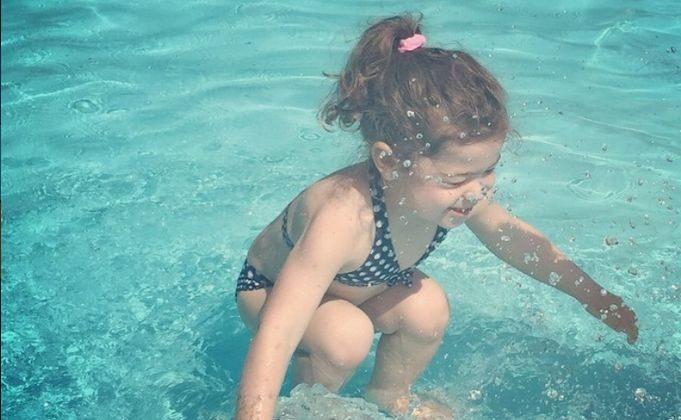 Baffling Photo: Is This Girl Jumping In a Pool or Underwater?