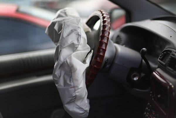 A deployed airbag in a Chrysler vehicle at a junkyard in Medley, Fla., on on May 22, 2015. (Joe Raedle/Getty Images)