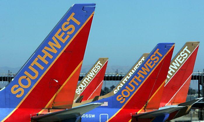 Southwest Apologizes After Video Shows Woman Being Forcefully Removed From Plane