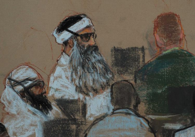 An image of a courtroom shows Khalid Sheikh Mohammed (C) and co-defendant Walid Bin Attash (L) attending a pre-trial session in Guantanamo Bay, Cuba, on Dec. 8, 2008. (Sketch by Janet Hamlin-Pool/Getty Images)