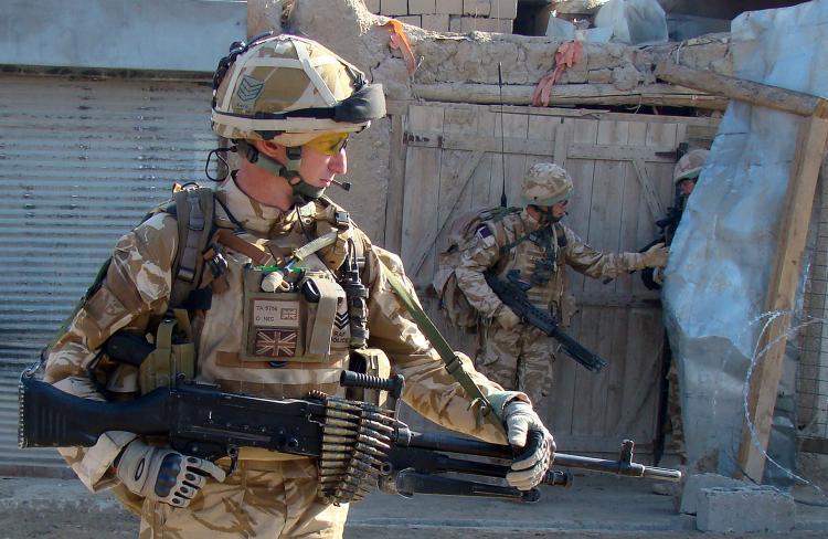 British soldiers with the NATO-led International Security Assistance Force patrol in the Sangin district of Helmand Province, Afghanistan, on Dec. 2, 2009. (Abdul Malik/AFP/Getty Images)
