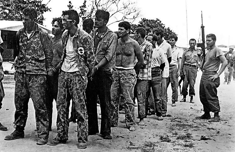 This April, 1961 file photo shows a group of Cuban counter-revolutionaries, members of Assault Brigade 2506, after their capture in the Bay of Pigs, Cuba. (Miguel Vinas/AFP/Getty Images)