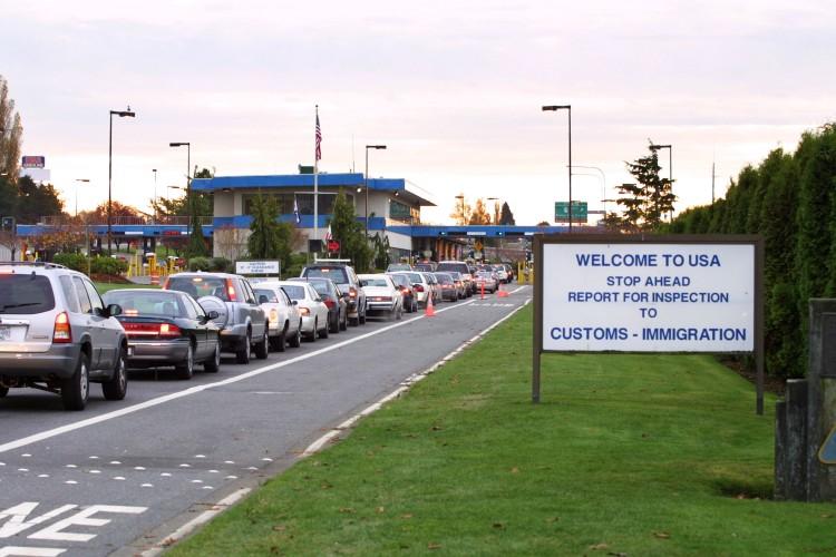 A file photo shows vehicles waiting to enter the U. S. at the border crossing between Blaine, Washington, and White Rock, B.C., in White Rock. (Jeff Vinnick/Getty Images)