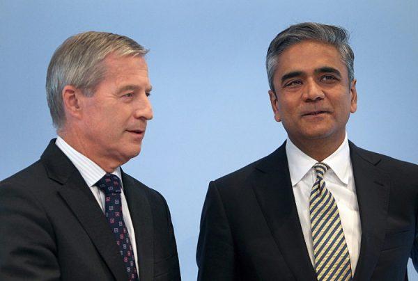 Anshu Jain (R) and Juergen Fitschen, co-CEOs of Germany's biggest bank Deutsche Bank, pose before addressing a news conference, in Frankfurt, on Sept. 11, 2015. (Daniel Rorland/AFP/GettyImages)
