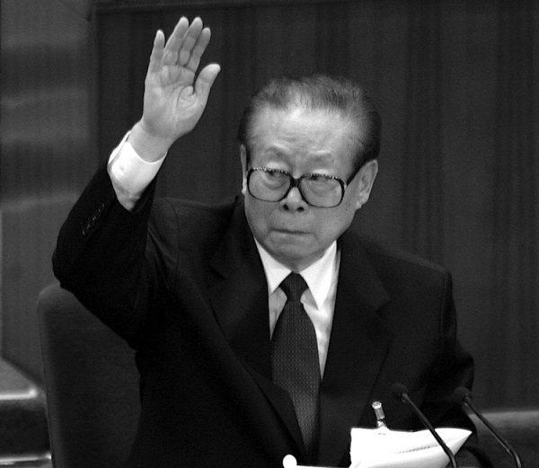 Former Communist Party head Jiang Zemin pictured in the Great Hall of the People on Oct. 21, 2007. As the Party leadership struggles over how to handle Bo Xilai, in the background is Jiang Zemin, who is ultimately responsible for the atrocities Bo carried out. (Goh Chai Hin/Getty Images)
