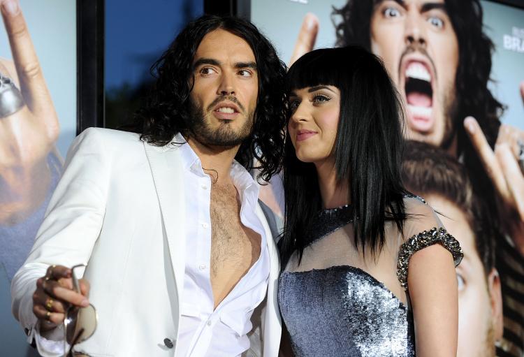 Actor Russell Brand and partner singer Katy Perry pose on the red carpet as they arrive for the premiere of the comedy movie "Get Him to the Greek" from Universal Pictures at the Greek Theatre in Los Angeles on May 25, 2010. (Mark Ralson/AFP/Getty Images)