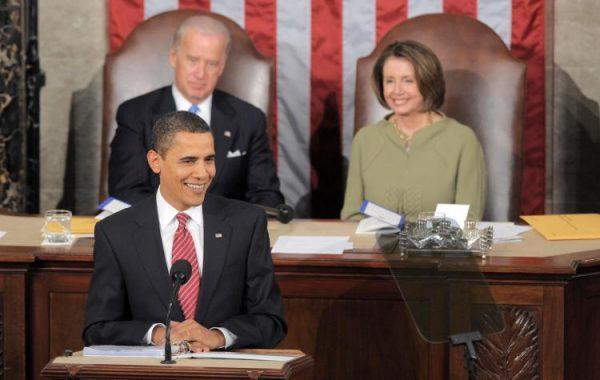 Former President Barack Obama, flanked by former Vice President Joe Biden and Speaker of the House Nancy Pelosi in 2009. (Saul Loeb/AFP/Getty Images)
