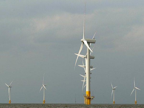 Scroby Sands wind farm, 2 miles off the coast of Britain, is one of the UK's first commercial offshore wind farms; Cape Wind hopes to earn the same distinction in the United States. (Shaun Curry/AFP/Getty Images)