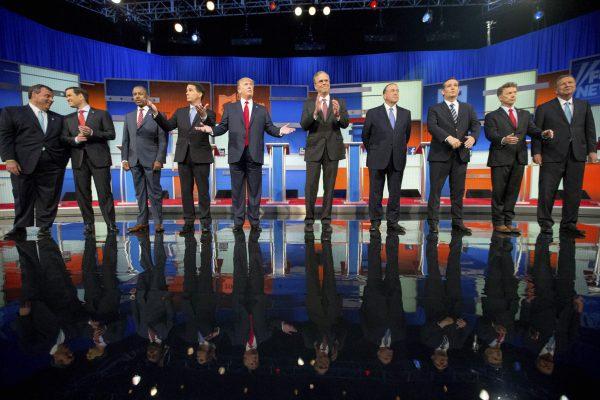 Republican presidential candidates from left, Chris Christie, Marco Rubio, Ben Carson, Scott Walker, Donald Trump, Jeb Bush, Mike Huckabee, Ted Cruz, Rand Paul, and John Kasich take the stage for the Republican presidential debate in Cleveland on Aug. 6, 2015. (Andrew Harnik/AP Photo)