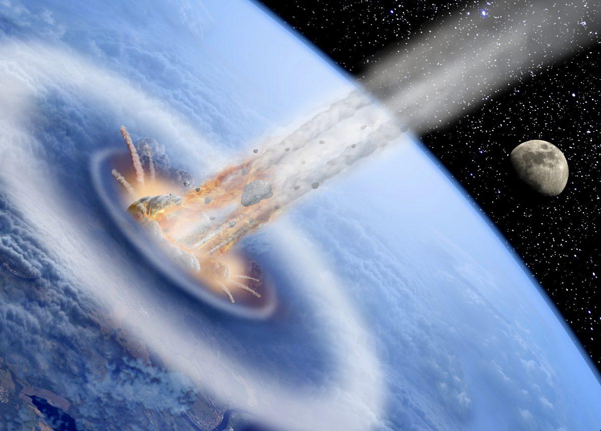 An artist's conception of a giant asteroid hitting the early earth. (puchan/iStock)
