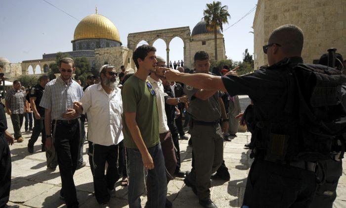Jewish, Muslim Groups Raise Temperature at Contested Shrine