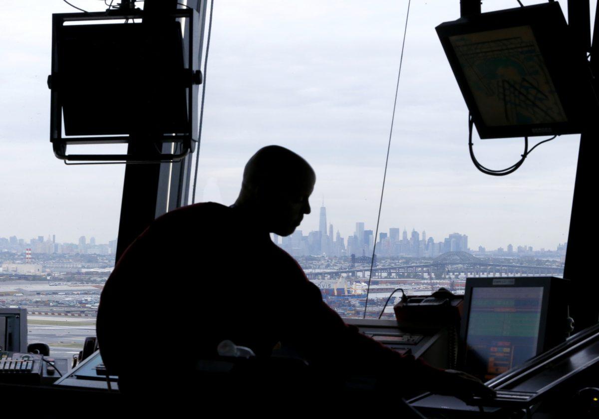 An air traffic controller works in the tower at Newark Liberty International Airport, in Newark, N.J., on May 21, 2015. (Julio Cortez/AP Photo)