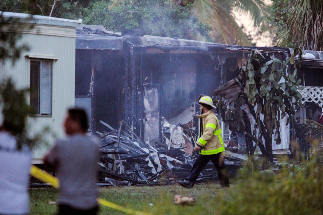 2 Killed When Small Plane Crashes Into Mobile Homes