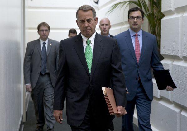 House Speaker John Boehner of Ohio arrives for a caucus meeting on Capitol Hill in Washington, D.C., on Oct. 21, 2015. (AP Photo/Carolyn Kaster)