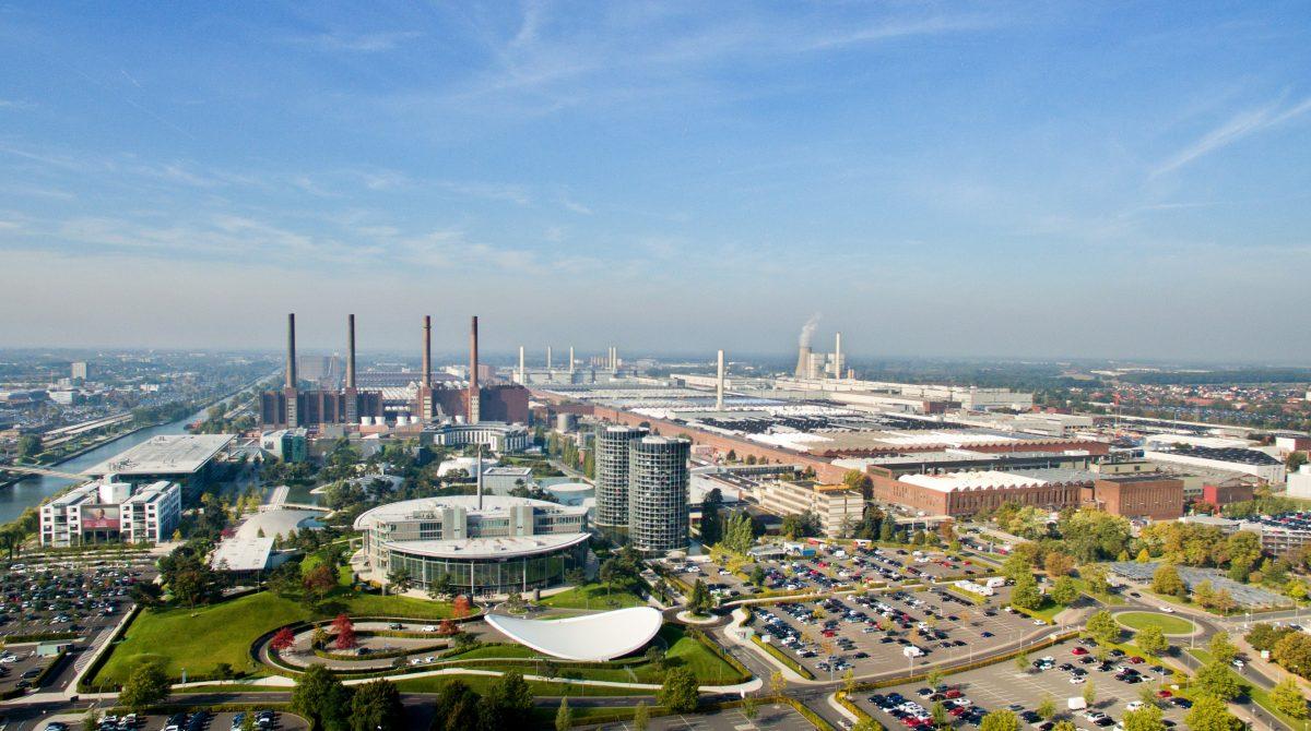 The Volkswagen factories and administration and sales buildings in Wolfsburg, Germany, on Oct. 5, 2015. For Volkswagen, the cost of its cheating on emissions tests in the U.S. is likely to run into the tens of billions of dollars and prematurely end its long-sought status as the world's biggest carmaker. (Julian Stratenschulte/DPA via AP)