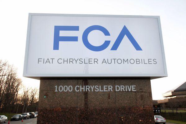 The new Fiat Chrysler Automobiles (FCA) Group sign is shown at the Chrysler Group headquarters in Auburn Hills, Michigan, on May 6, 2014. (Bill Pugliano/Getty Images)