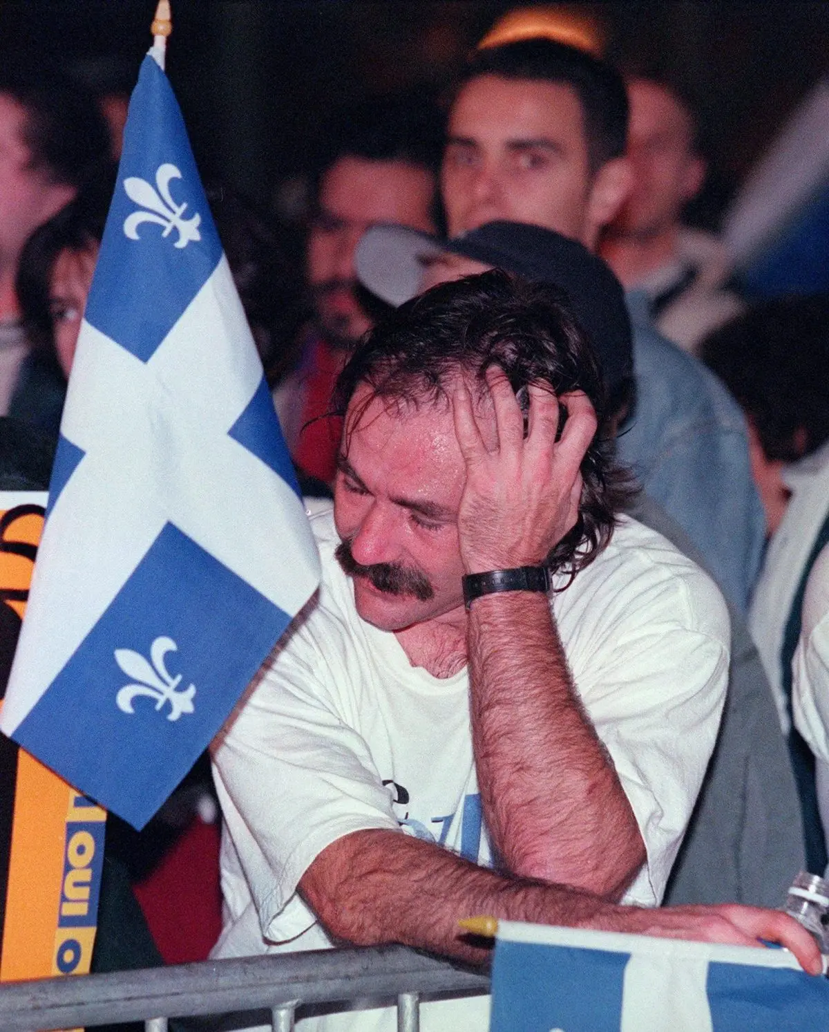 A Quebec independence supporter at the campaign headquarters in Montreal looks dejected as vote results come in on the Quebec referendum on the night of Oct. 30, 1995. (The Canadian Press/Tom Hanson)