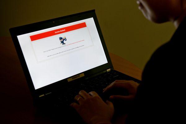  A laptop screen displaying a denial of access message on a censored Chinese website in Beijing, on Jan. 4, 2013. (STF/AFP/Getty Images)