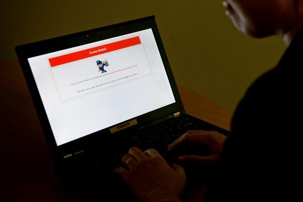 A laptop screen displaying a denial of access message on a censored Chinese website in Beijing, on Jan. 4, 2013. (STF/AFP/Getty Images)