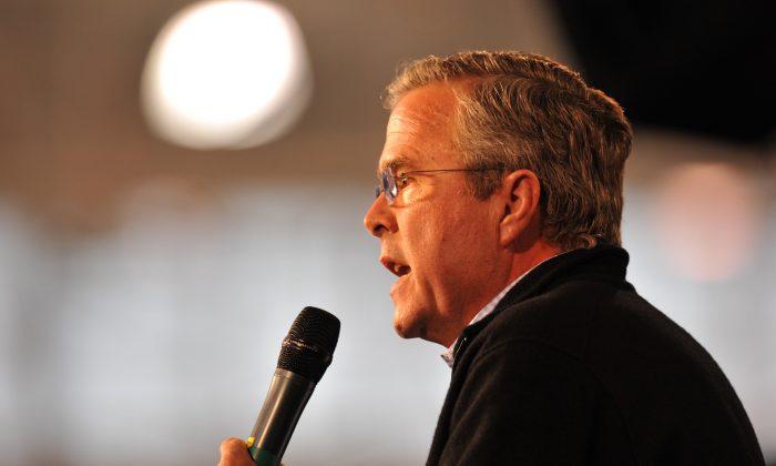 Jeb Bush Shadowed by Brother’s Foreign Policy Controversies