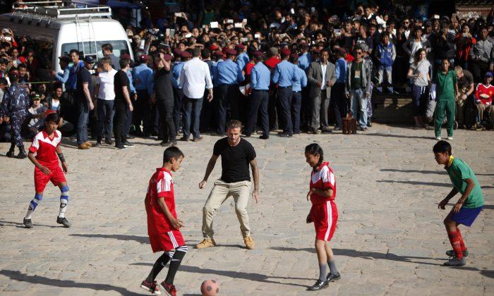 See David Beckham Play Soccer With Nepalese Children