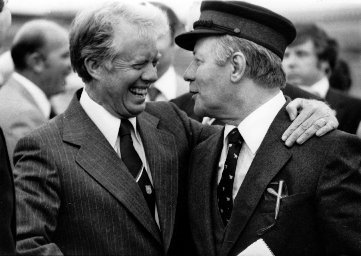 U.S. President Jimmy Carter and West German Chancellor Helmut Schmidt prepare to depart Berlin on July 15, 1978. (AP Photo)