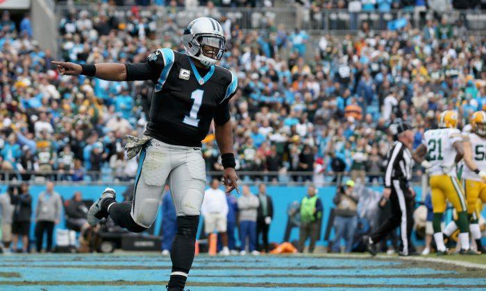 NFL Star Cam Newton Under Fire for Taking Down Banner at Game