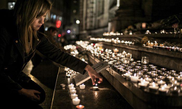 Paris Attacks’ Death Toll Hits 129; 352 Hurt