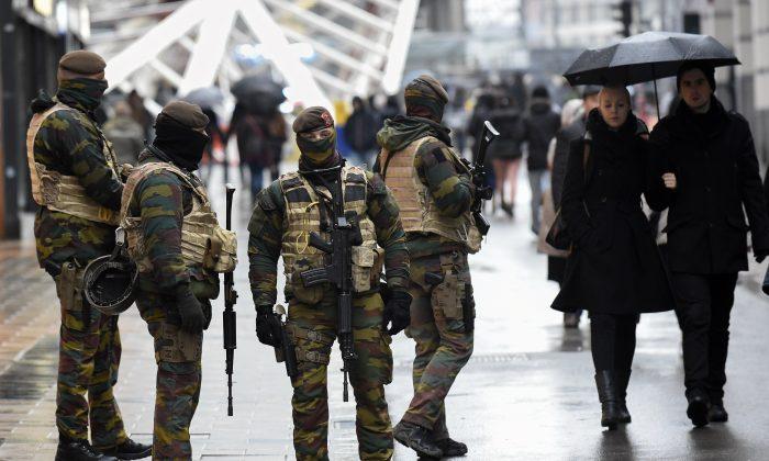 Belgium Terror Alert: Brussels Lockdown Sparked by Fears That Paris Terrorist Is in City