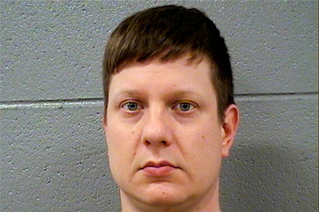 The Latest: Chicago Officer Posts Bond, Leaves Jail
