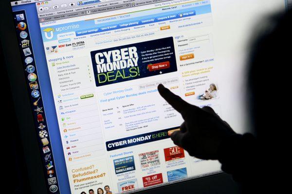 A consumer looks at Cyber Monday sales on her computer at her home in Palo Alto, Calif., on Nov. 29, 2010 (AP Photo/Paul Sakuma).