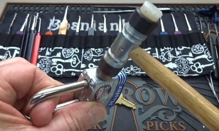 Viral Video Apparently Shows Guy Opening Up Master Lock With a Small Hammer